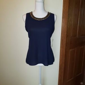 5 for $25.  Sleeveless blouse